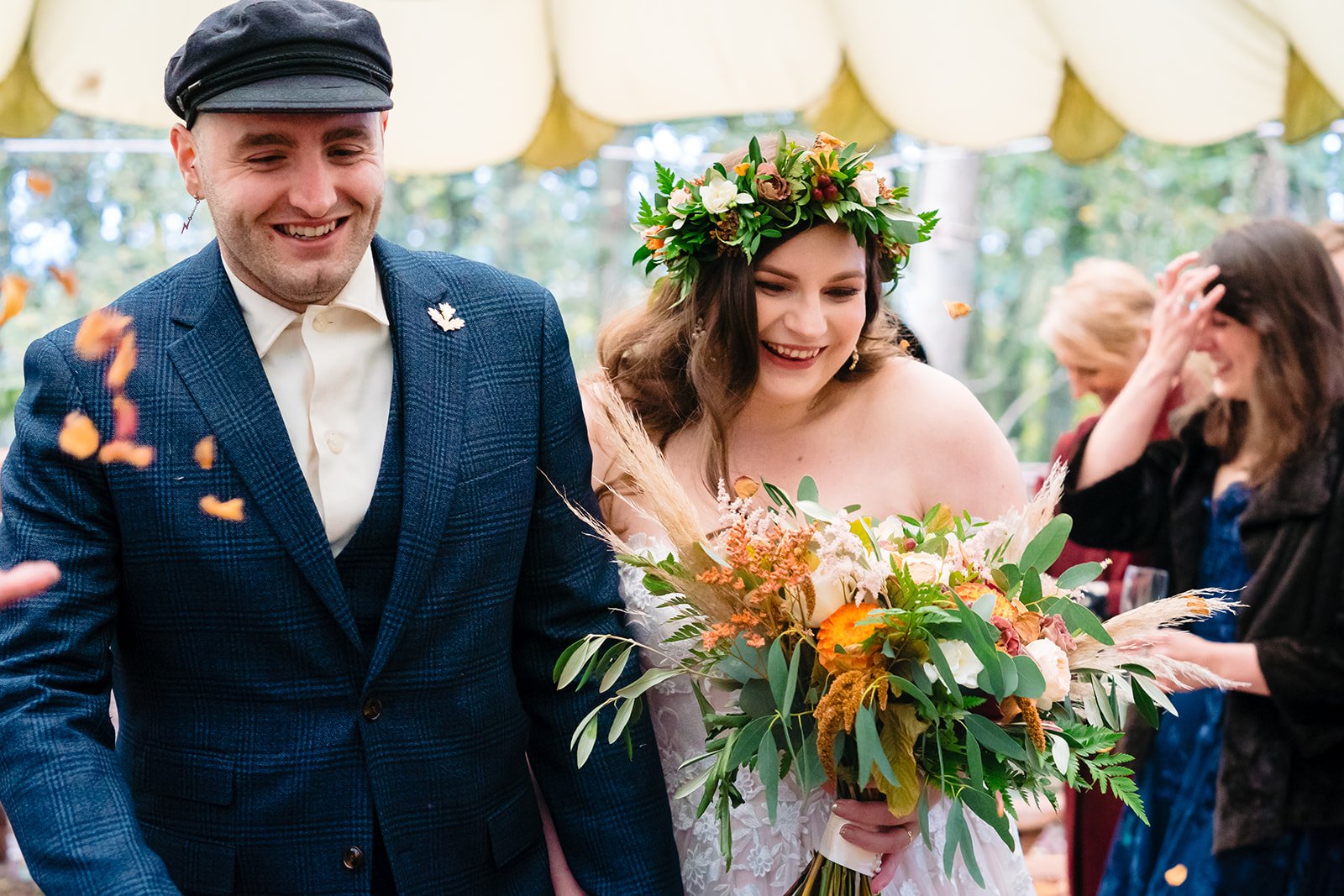 Bride and groom confetti exit at cockly wood weddings