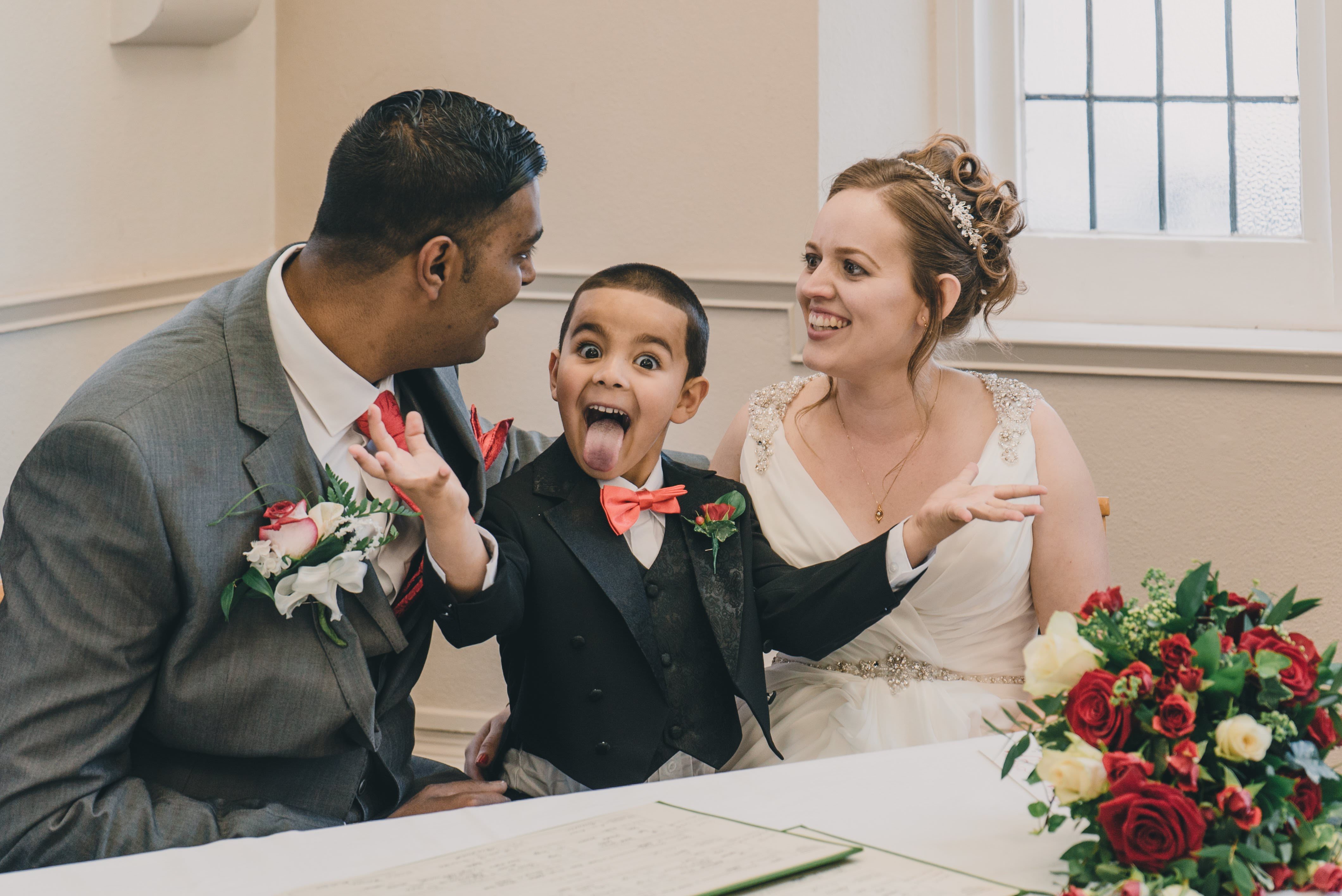 son dressed in groomsman attire