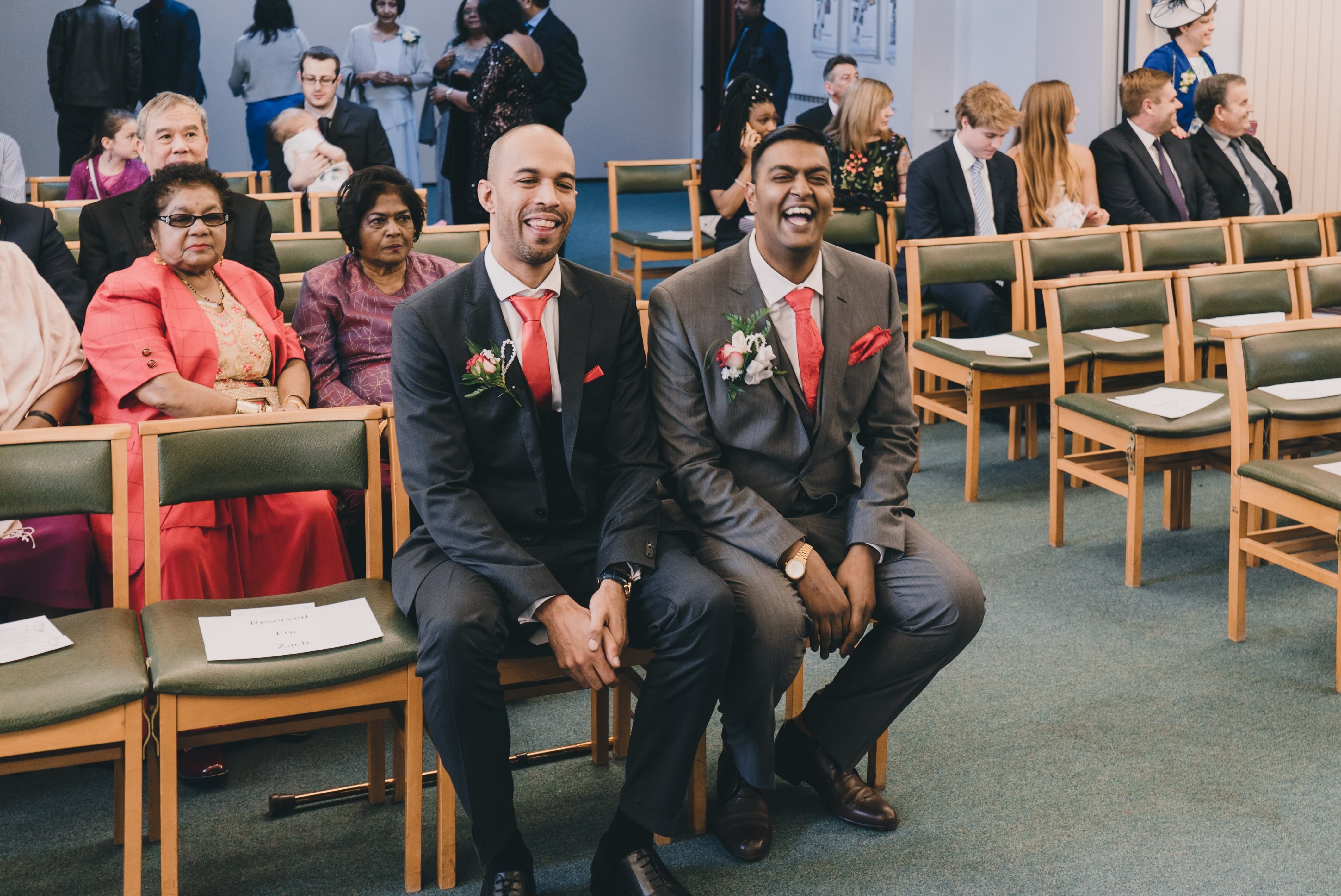 Groom laughing and joke from a priest