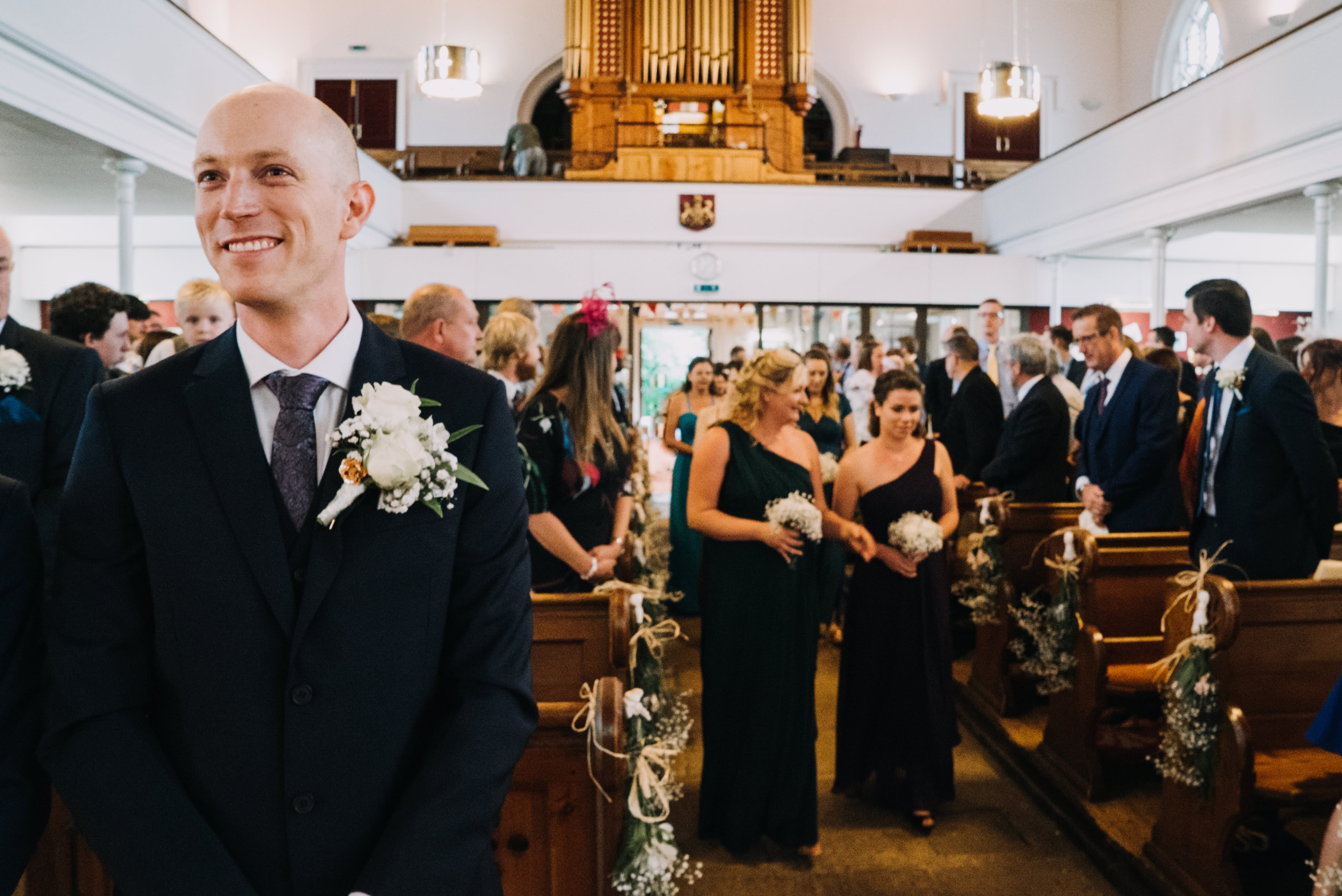 Groom waiting for this bride