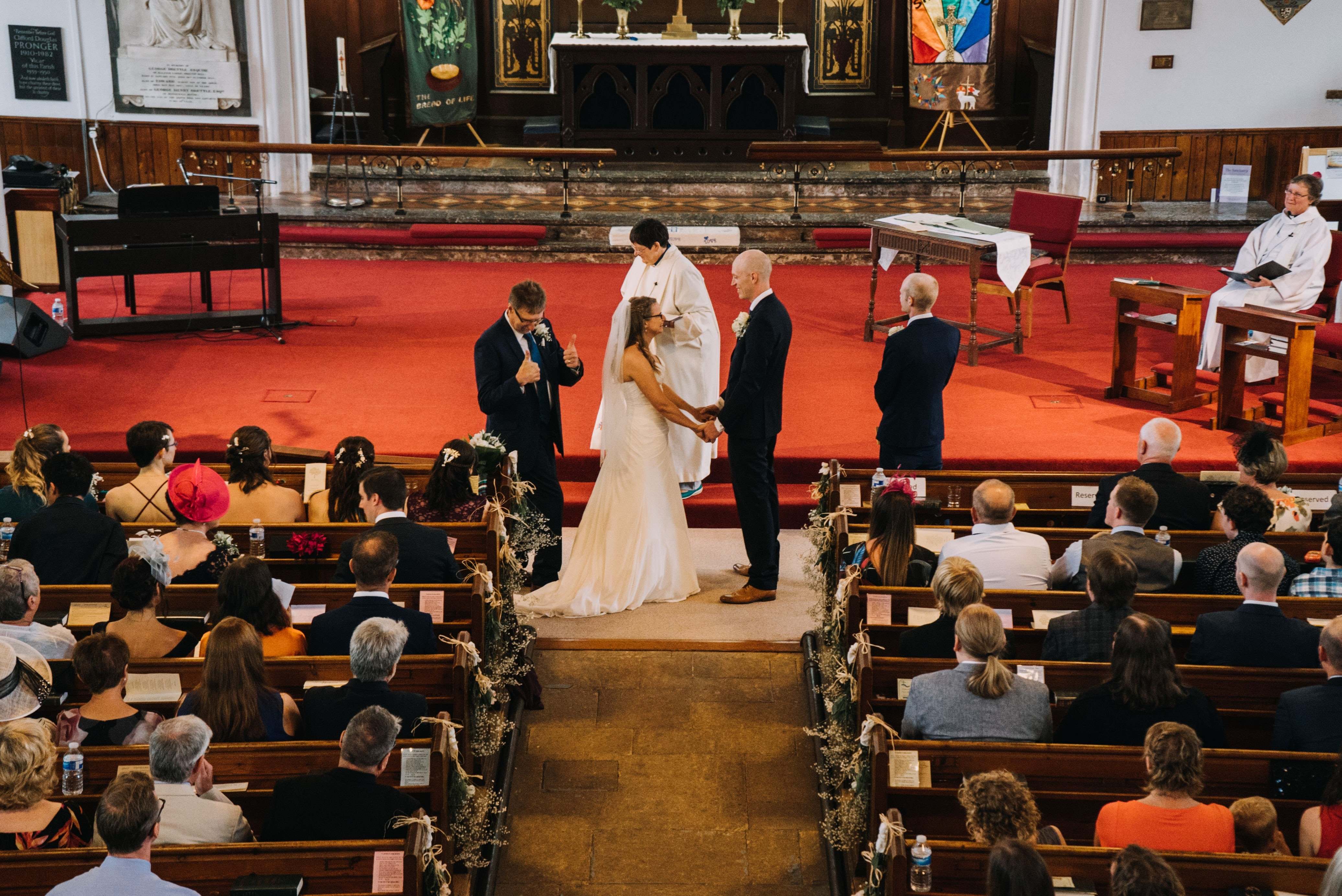 father giving away the bride