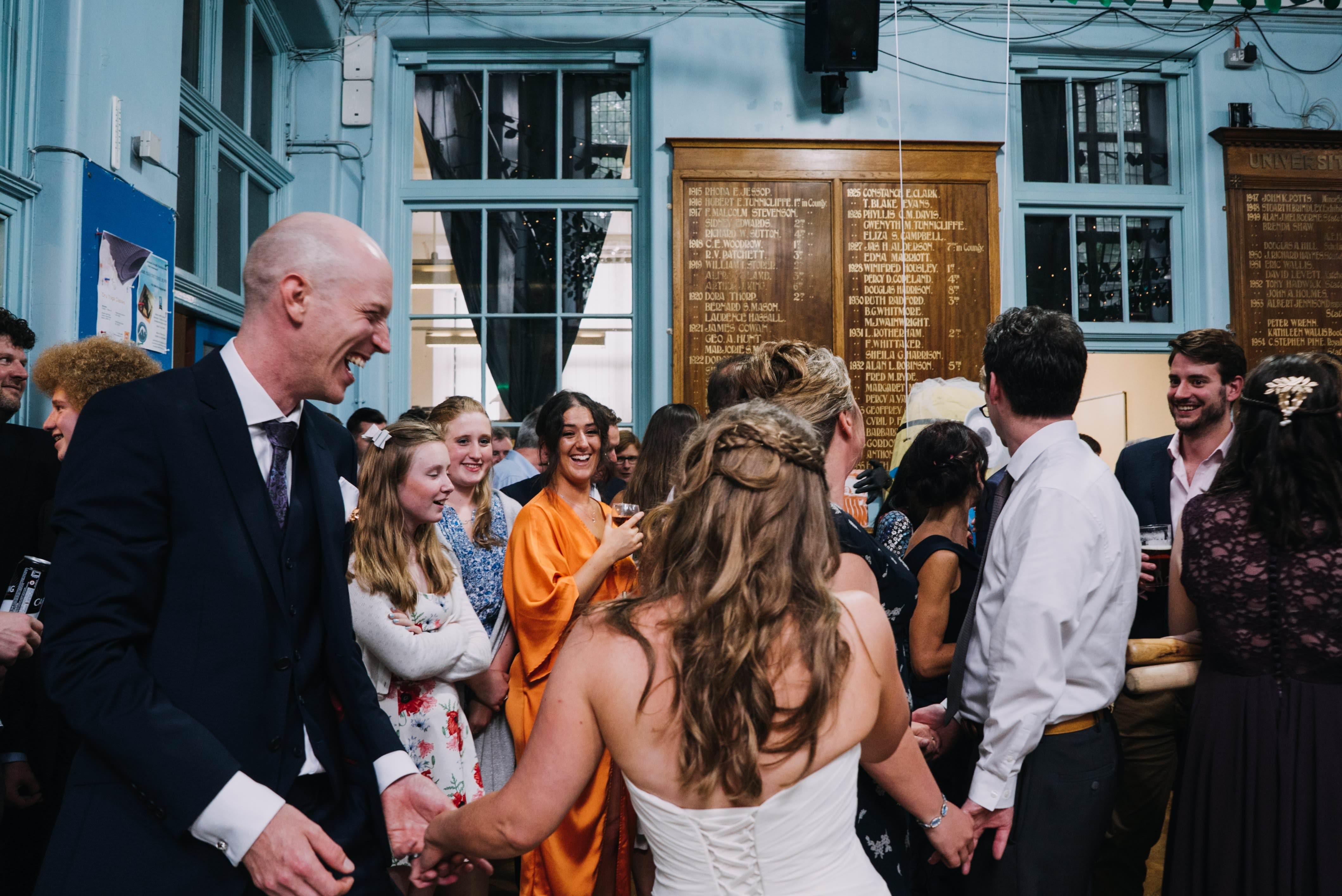 Bride and groom laughting
