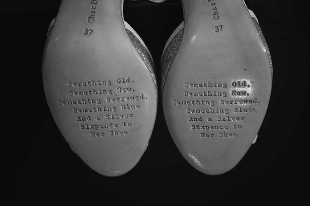 Wedding shoe soles with engraved traditional verse text