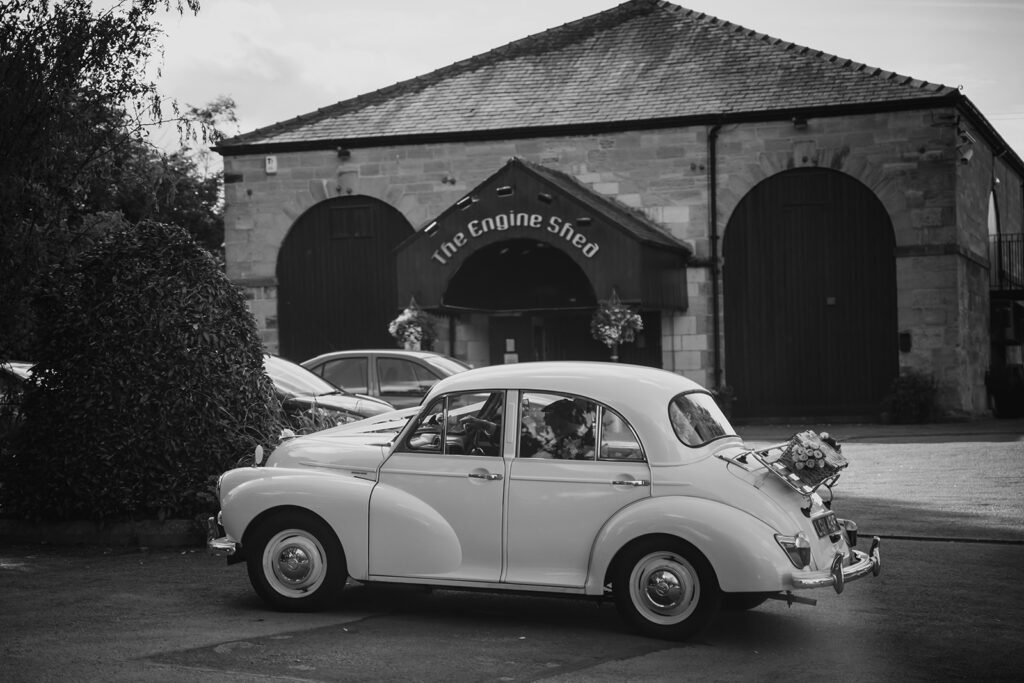 Vintage wedding car outside The Engine Shed building