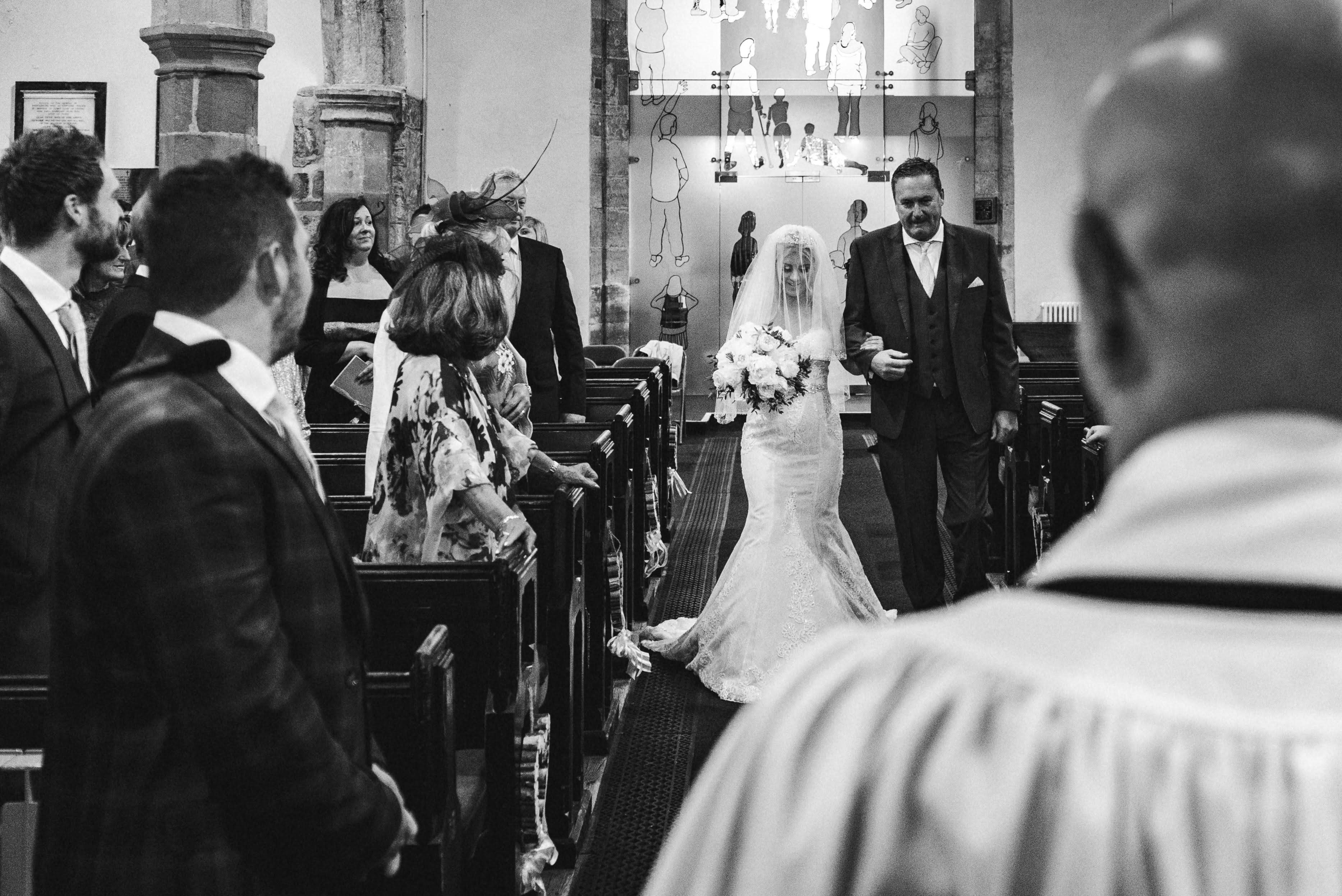 Bride coming down isle