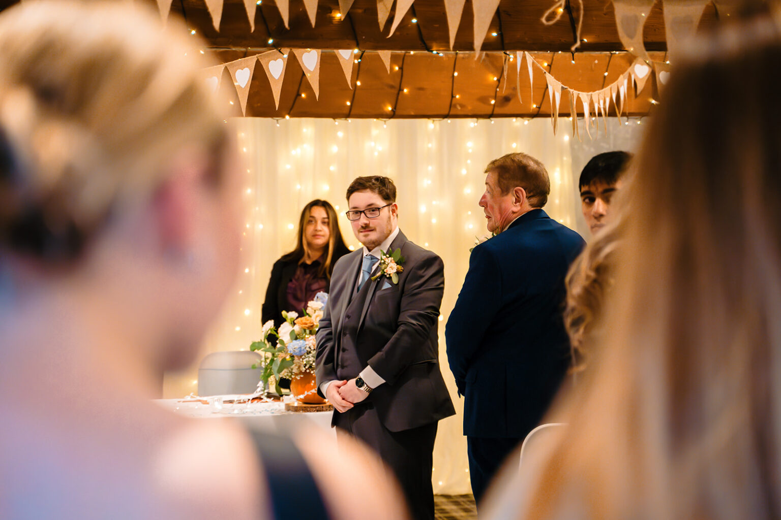 Dale waiting at the front of the ceremony room at The Old Barn at Esholt