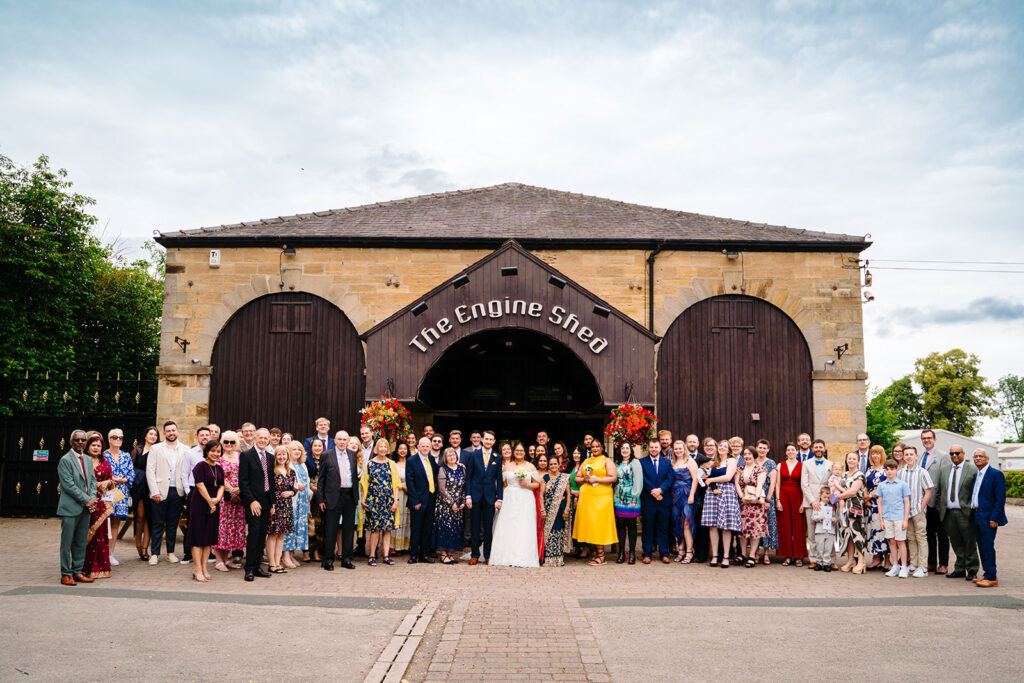 All of Fran and Andy's wedding guests together outside the front of the Engine Shed in Wetherby