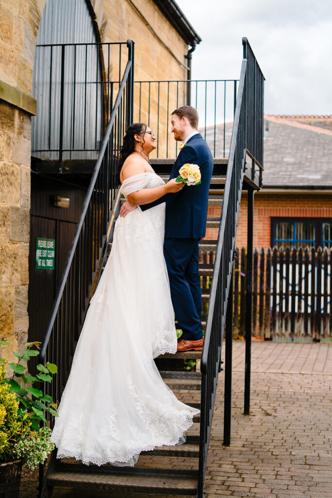 Fran and Andy on the iron staircase outside the Engine Shed, Wetherby