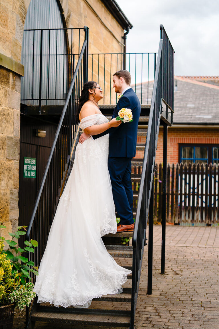 Fran and Andy on the iron staircase outside the Engine Shed, Wetherby