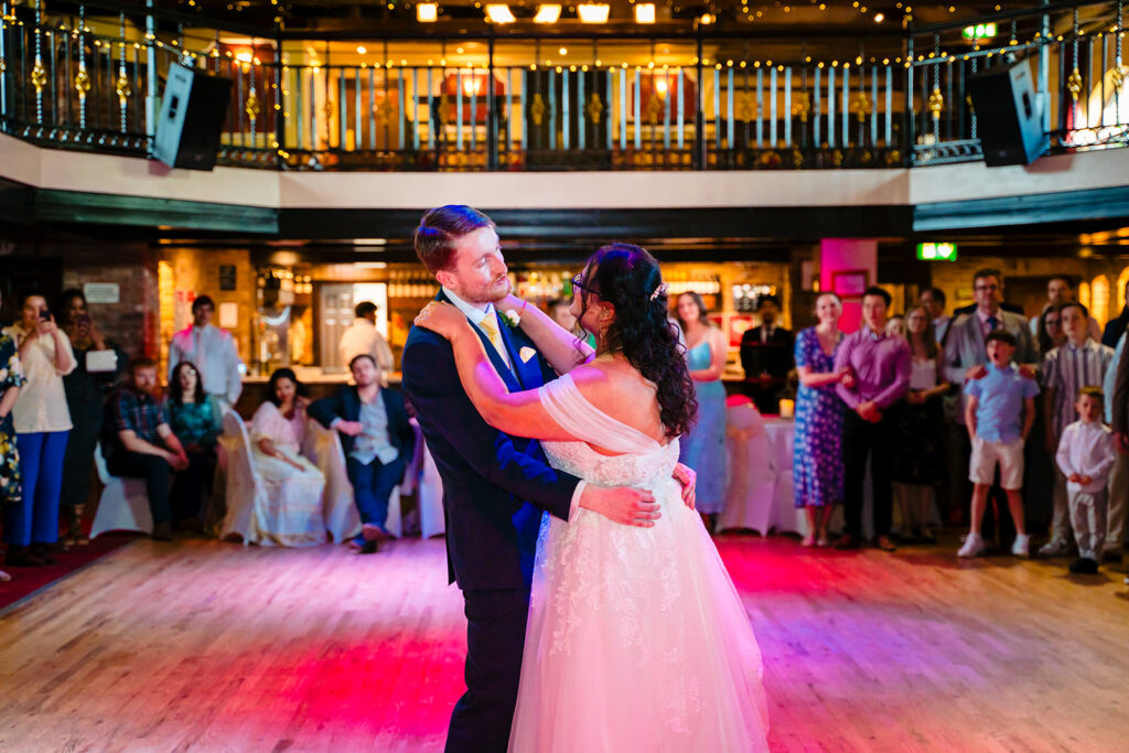 Andy holding Fran close during their first dance at the Engine Shed, Wetherby