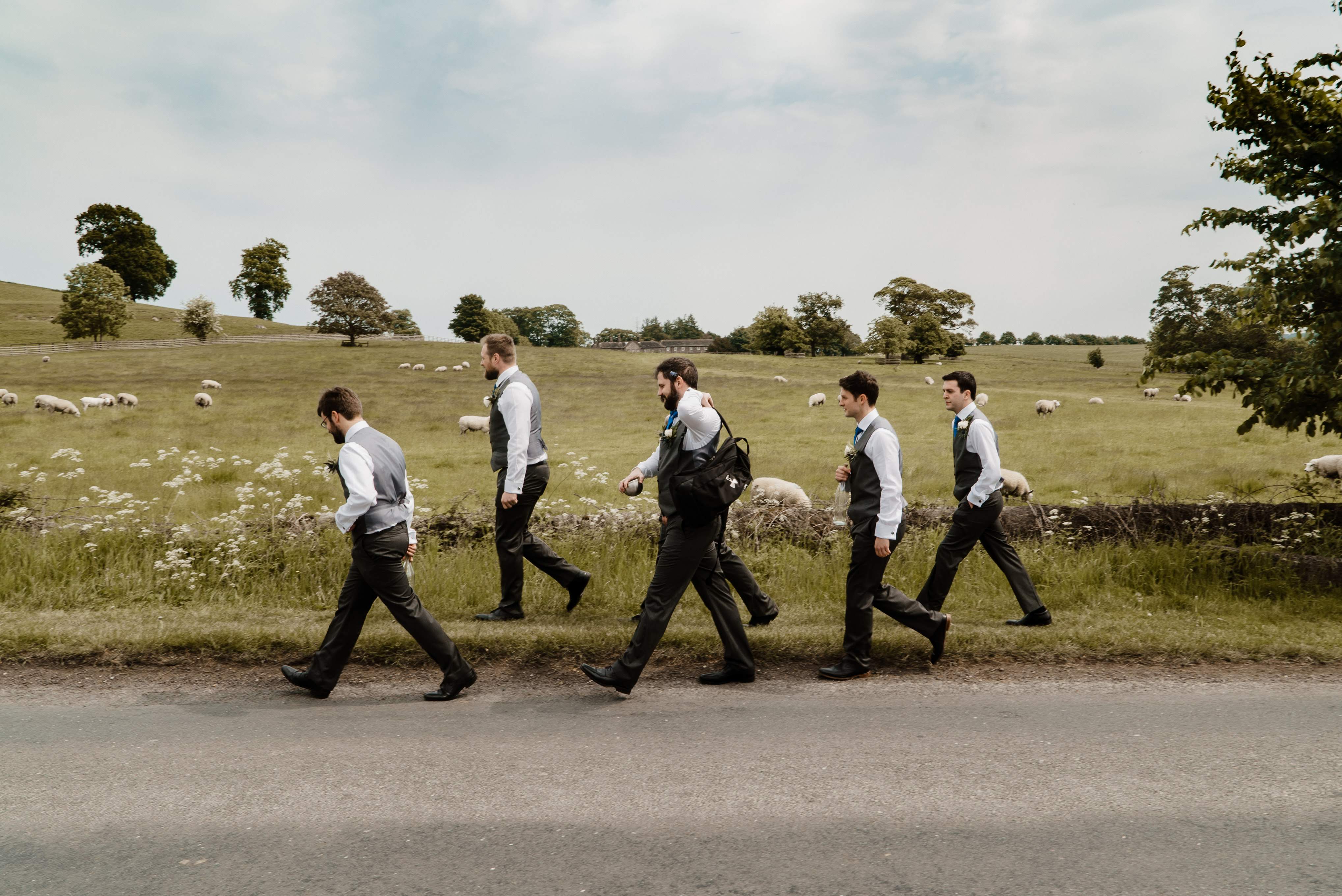 Groomsmen walking to Wedding