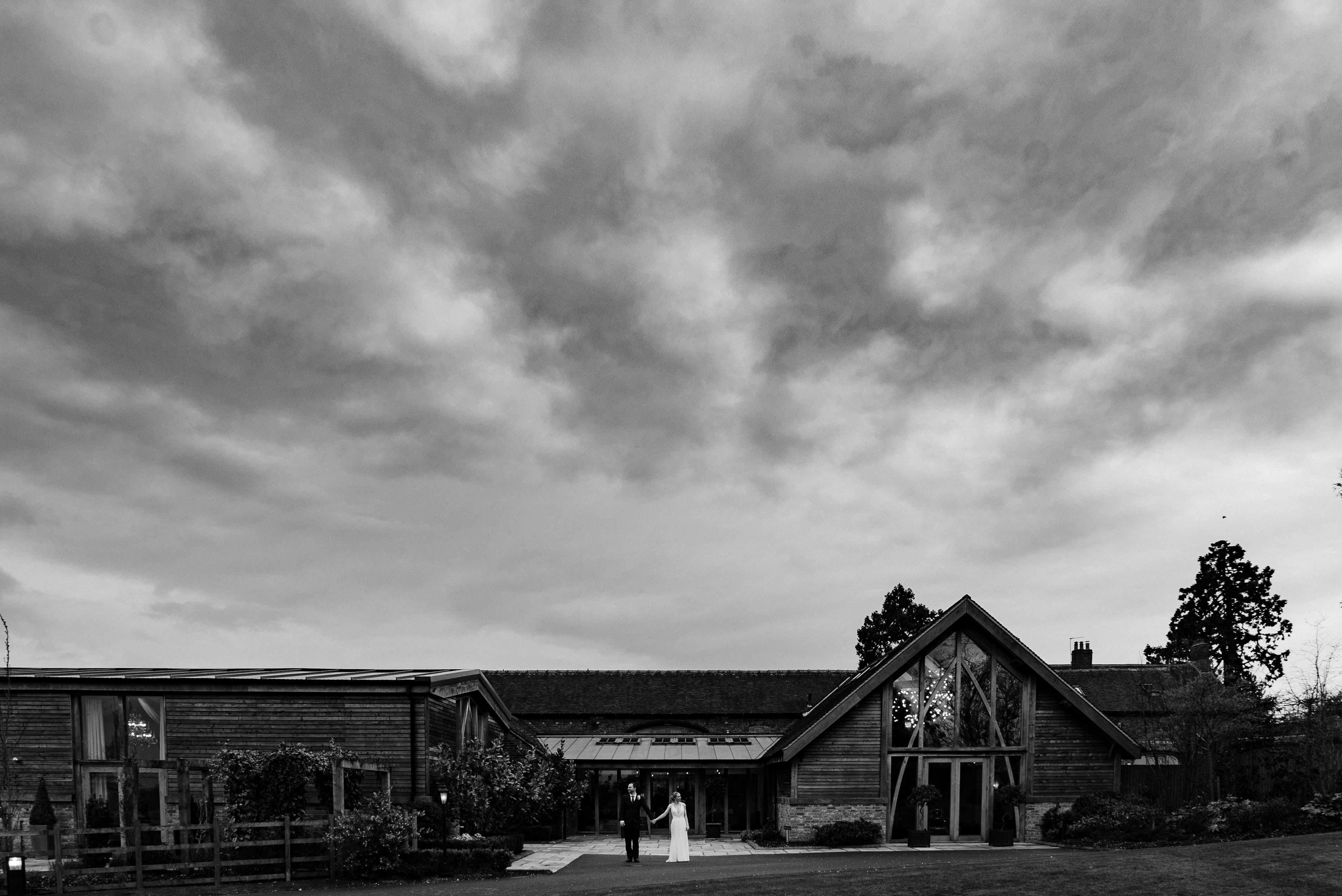 Bride and groom outside Mythe Barn