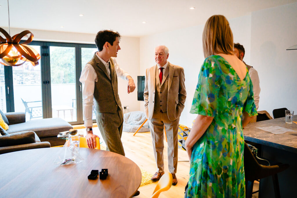 Groom greeting his parents before heading to the Priests House wedding venue