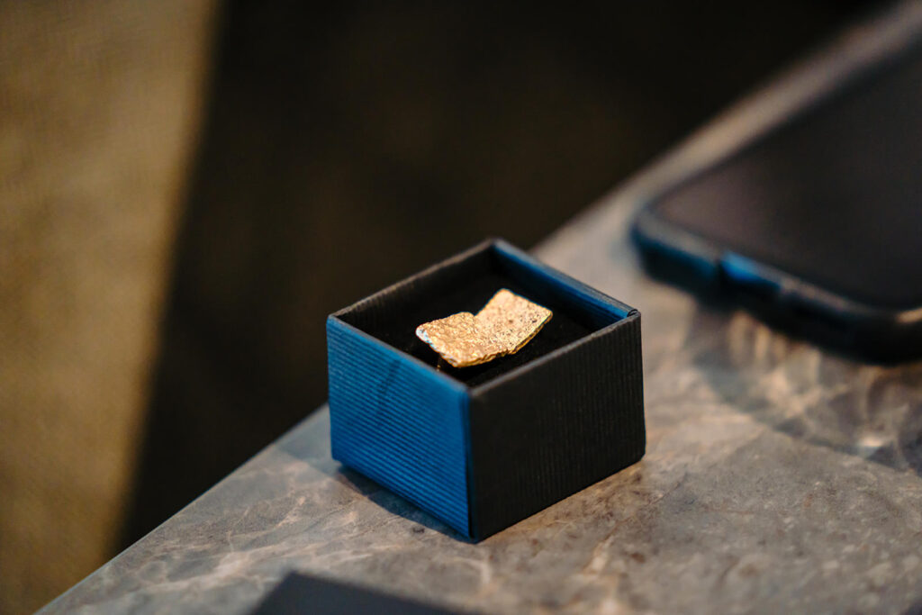 Close-up of Stephen Roper handcrafted cufflinks gifted by the bride