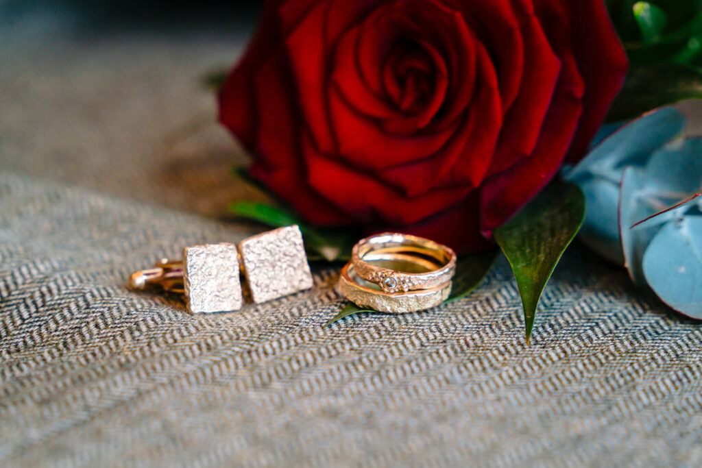 Detail shot of bespoke wedding rings by Stephen Roper at the Priests House wedding