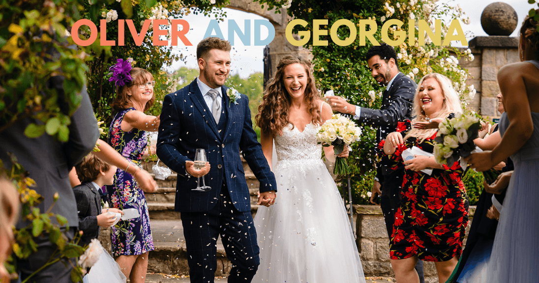 Happy couple celebrates outdoor wedding ceremony.