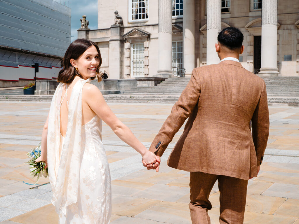 Bride and groom portrait in Millennium Square